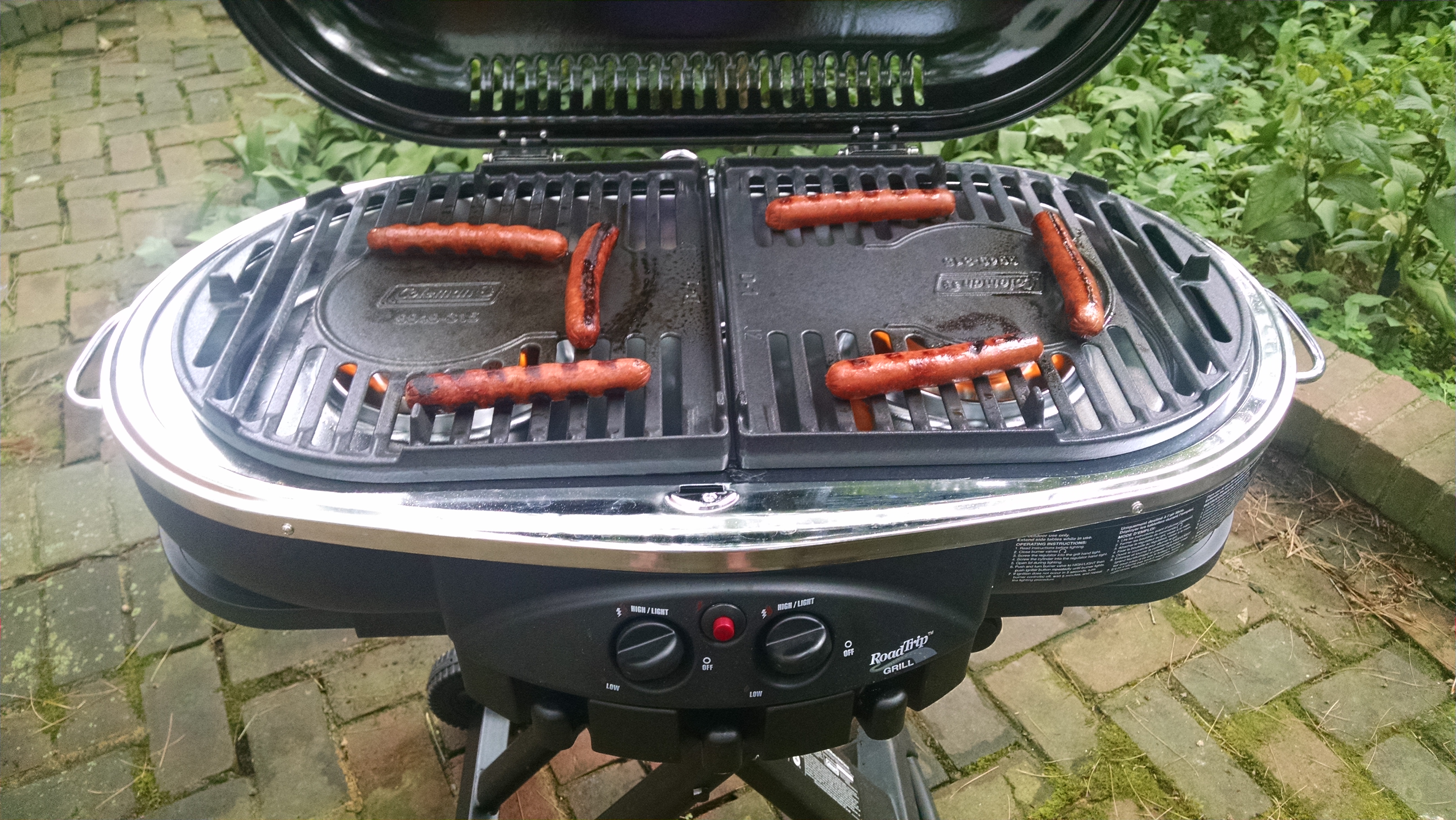 hot dogs on grill
